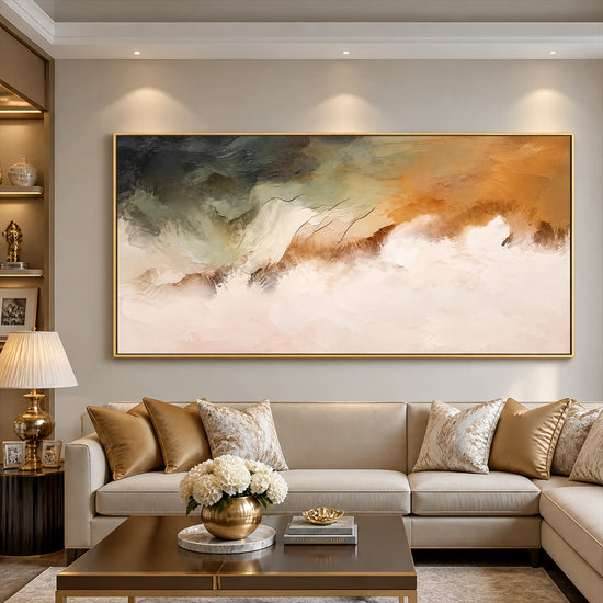 Ochre Mistfall artwork displayed above a cream sofa with gold accents.