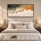 Ochre Mistfall artwork displayed above a bed and upholstered bench.