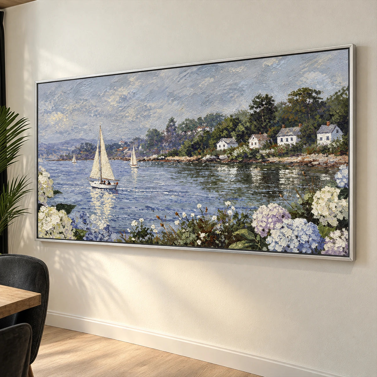Hydrangea Harbor artwork displayed on a sunlit wall beside a dining chair.