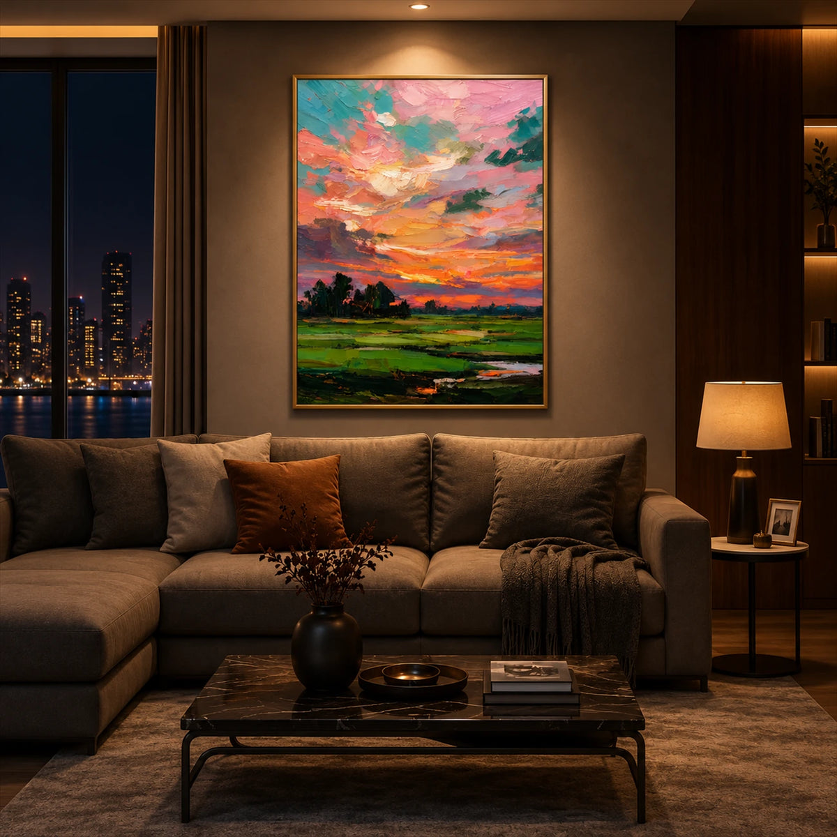 Coral Daybreak artwork displayed above a sofa beside evening city views.