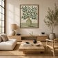 Olive Stripes artwork displayed above a pale sofa and wooden coffee table.