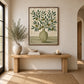 Olive Stripes artwork displayed above a simple wooden entryway table.