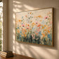 Apricot Meadow artwork displayed on a sunlit wall beside a wooden table.