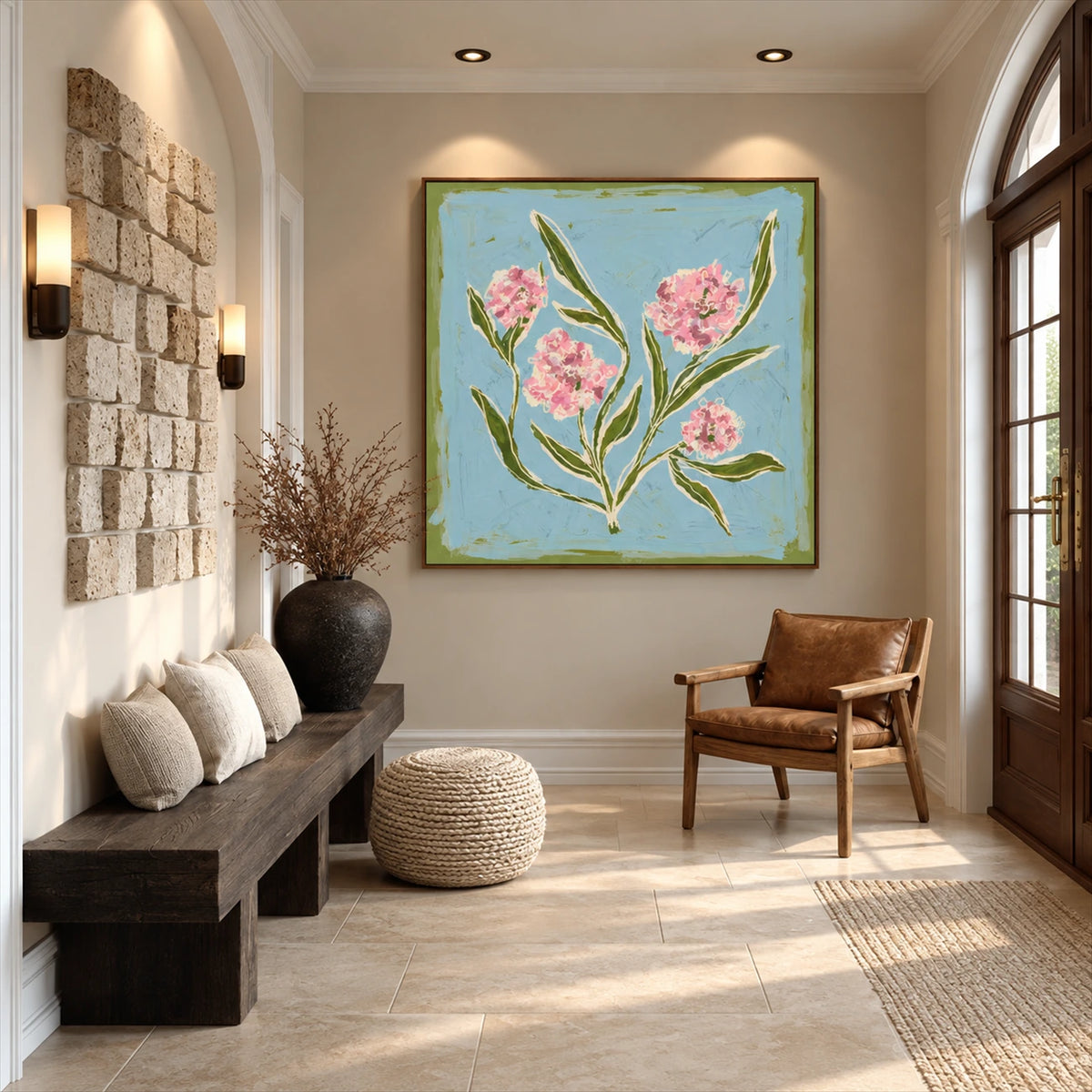 Blush Sprigs artwork displayed above a bench beside a woven stool.