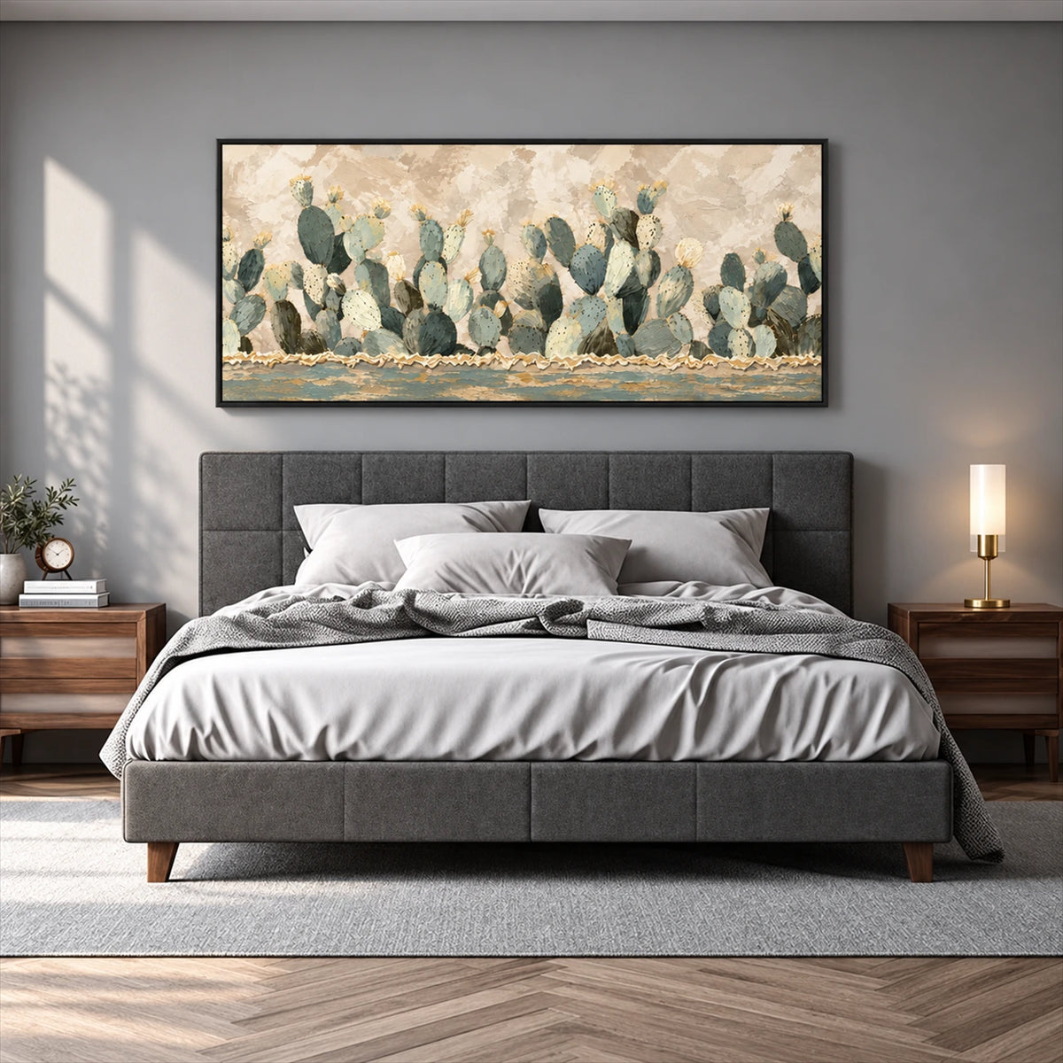 Sage Cactus Row artwork displayed above a gray upholstered bed.