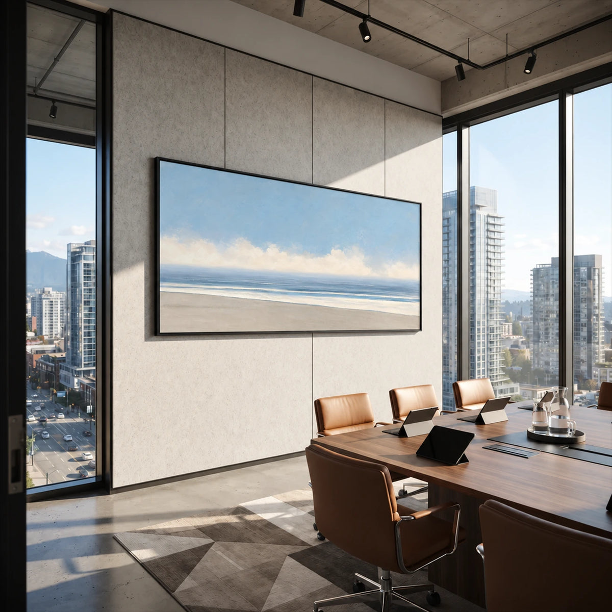 Open Shoreline artwork displayed beside a conference table and city-view windows.