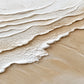 Sandy Tides full artwork. White textured waves sweep diagonally across a warm sandy ground, their raised edges casting delicate shadows.