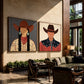 Frontier Duet two-panel artwork set displayed above a leather sofa beside tall windows.
