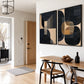 Noir Geometry two-panel artwork set displayed above a wooden dining table.