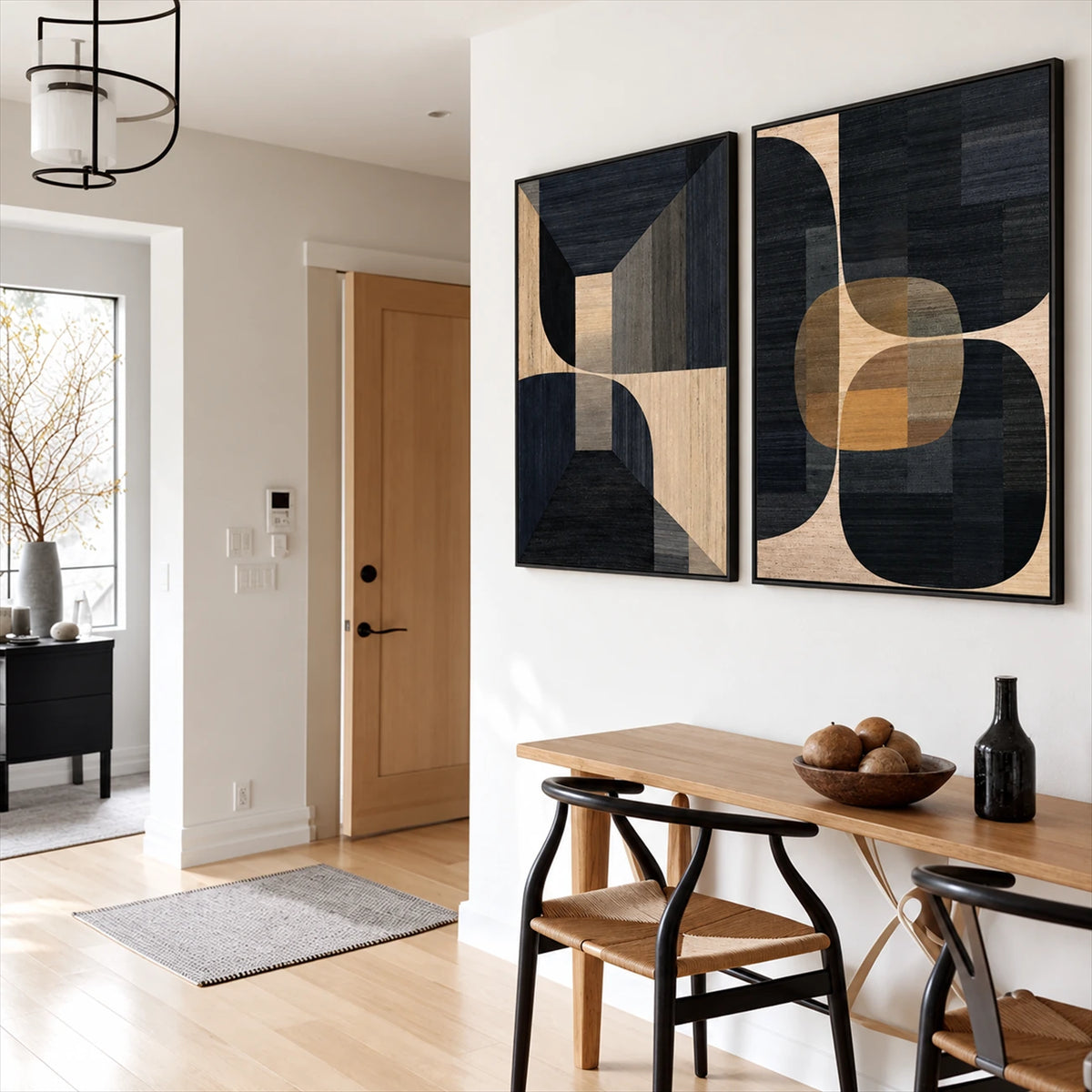 Noir Geometry two-panel artwork set displayed above a wooden dining table.