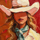 Coral Cowgirl full artwork. A cowgirl with flowing golden hair and a turquoise scarf looks out beneath a broad pale hat against a warm red ground.