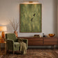 Olive Hover artwork displayed above a long wooden sideboard beneath a picture light.
