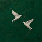 Emerald Flight full artwork. Two ivory birds sweep toward one another across a deep emerald-green ground.