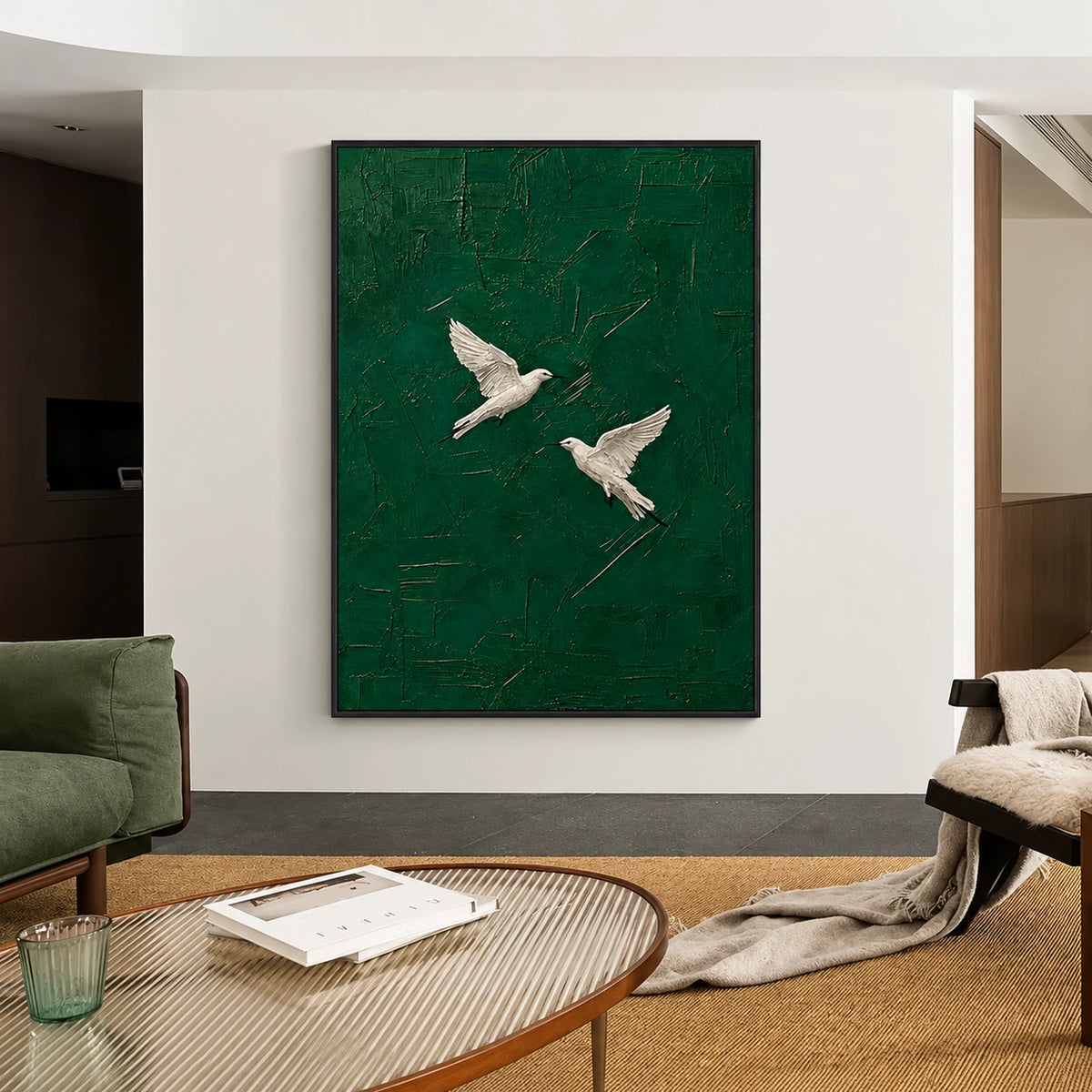 Emerald Flight artwork displayed above a curved coffee table beside green seating.