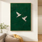 Emerald Flight artwork displayed above a sofa near a sunlit window.