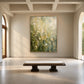 Meadow Haze artwork displayed above a rustic bench in an airy entryway.