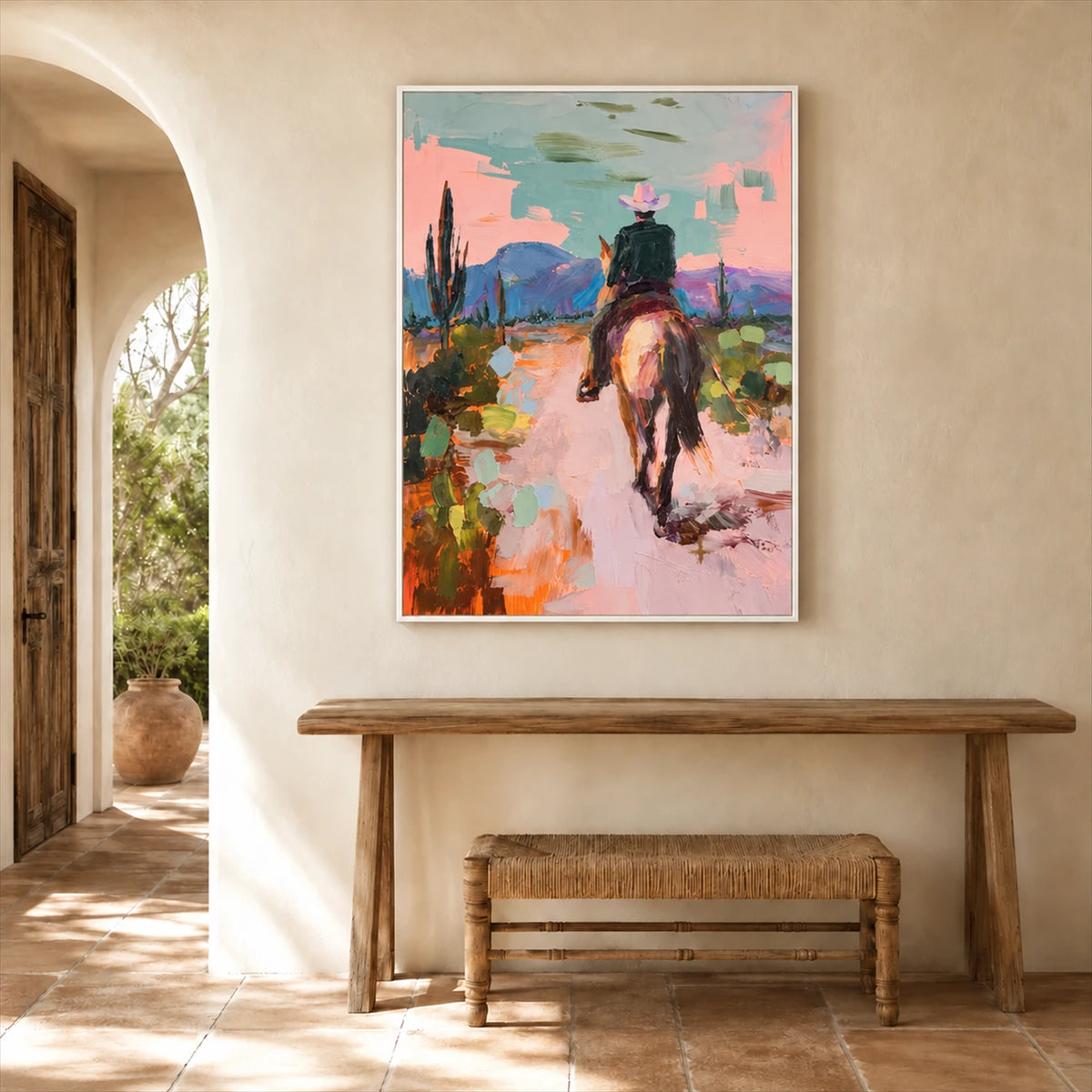 Pastel Outrider artwork displayed above a console and woven bench.