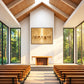 Sacred Gathering artwork displayed on a chapel wall above a fireplace.