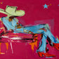 Turquoise Reverie full artwork. A reclining cowgirl in turquoise and a mint-colored hat stretches out in vivid red boots.