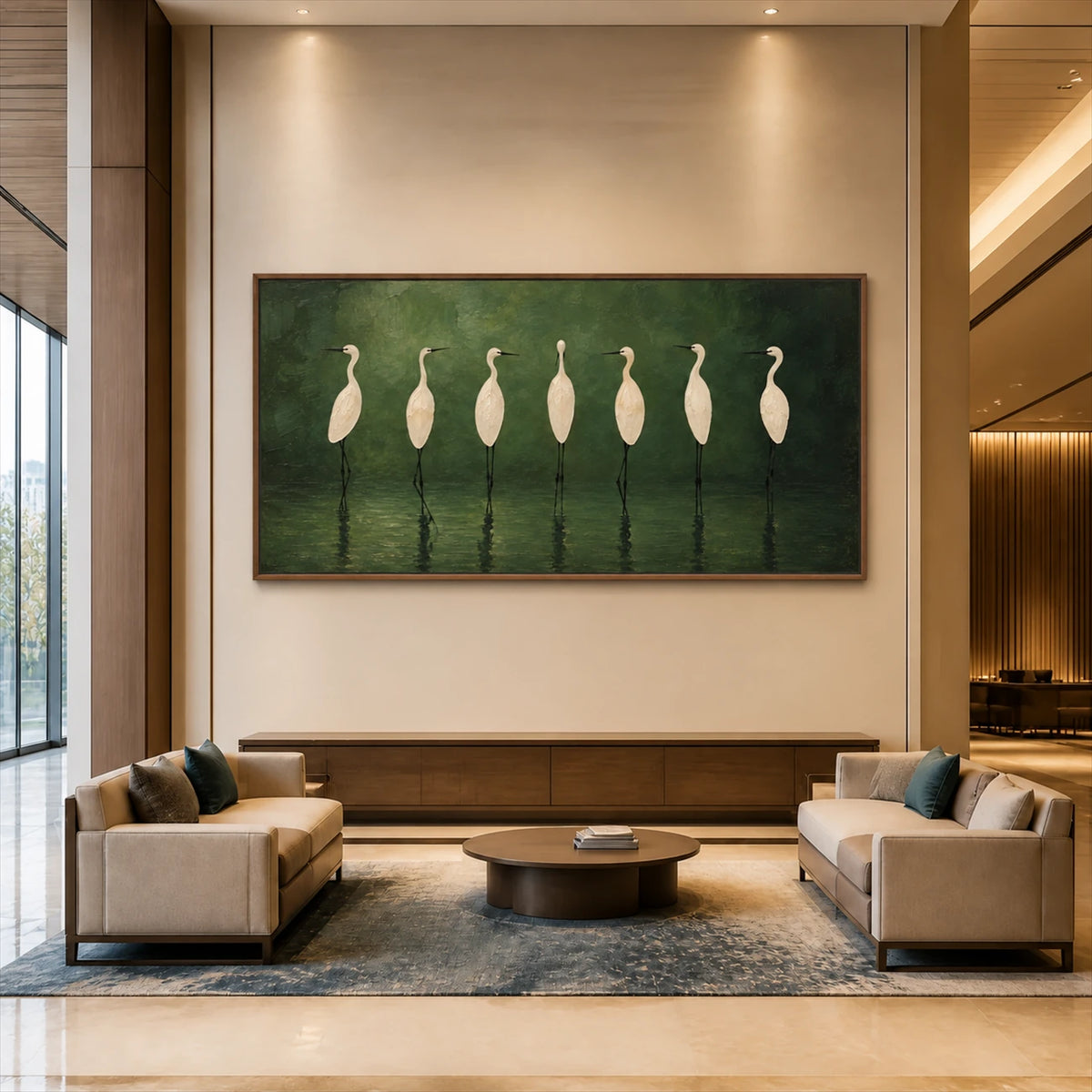 Heron Assembly artwork displayed above a wood console between armchairs.