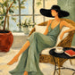 Sage Siesta full artwork. A woman in a flowing sage dress and wide black hat relaxes beside a sunlit window.