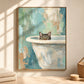 Bathside Peek artwork displayed above a bathroom counter with folded towels.