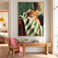 Gingham Nap artwork displayed above a carved wood bench beside a wicker chair.