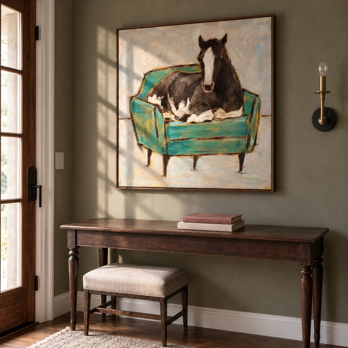 Armchair Steed artwork displayed above a console and stool.