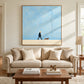Little Stroll artwork displayed above a cream sofa.