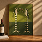 Frog Toast artwork displayed leaning on a wood counter beside a wine bottle.