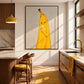 Banana Break artwork displayed in a kitchen with mustard pendant lights and stools.
