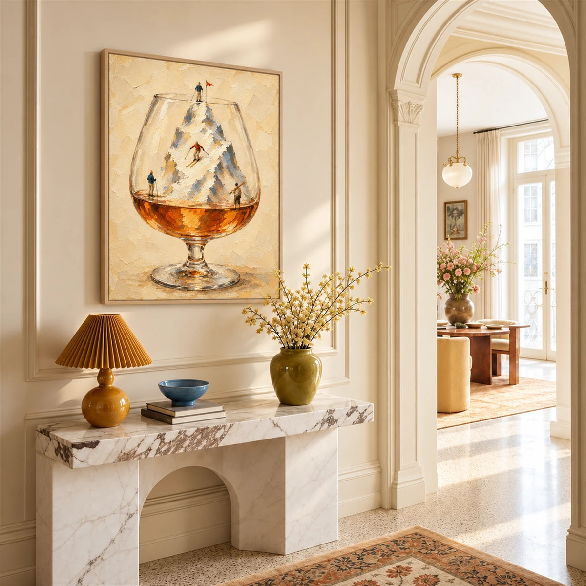Alpine Aperitif artwork displayed above a marble console in an arched hallway.