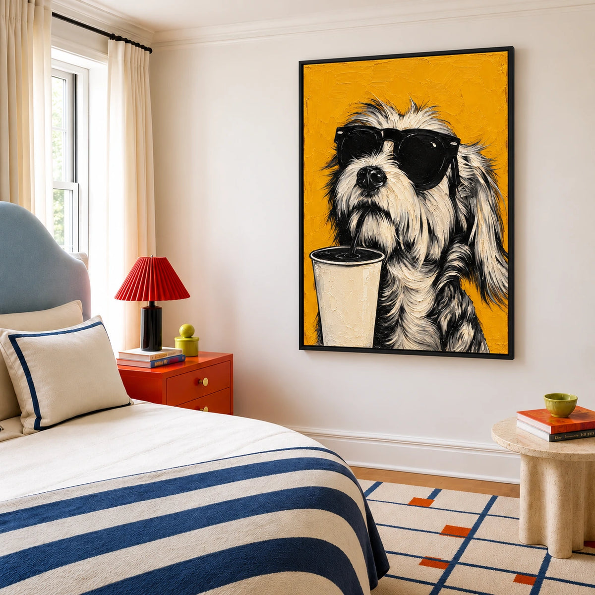 Brew Buddy artwork displayed beside a bed with striped bedding.