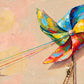 Pinwheel Makers full artwork. Tiny figures pull colorful ropes and climb ladders around an enormous rainbow pinwheel.