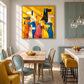 Rainbow Pack artwork displayed above a dining table beside a kitchen.