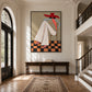 Scarlet Poise artwork displayed above a console in a double-height entry hall.