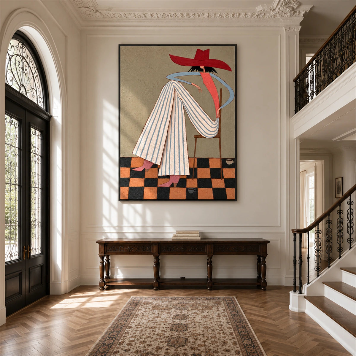 Scarlet Poise artwork displayed above a console in a double-height entry hall.