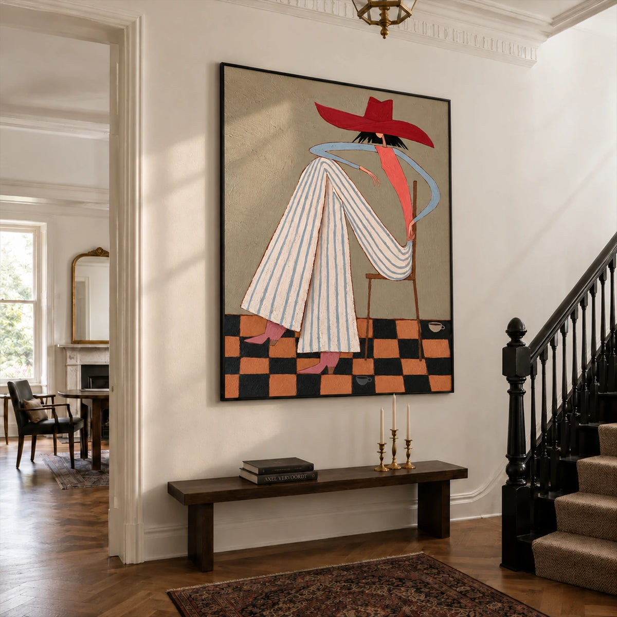 Scarlet Poise artwork displayed above a hallway bench beside a staircase.