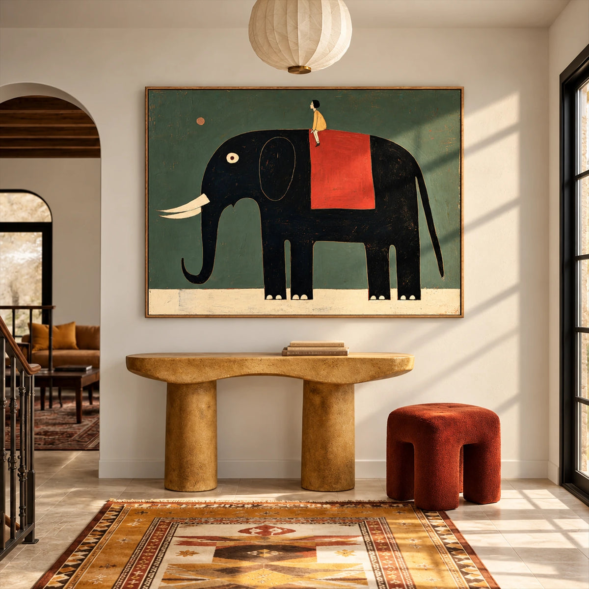 Gentle Giant artwork displayed above a rounded console in an entryway.