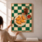 Dino Bites artwork displayed being positioned on a wall above a wooden console.