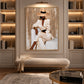 Ivory Composure artwork displayed above a cushioned bench between built-in shelves.