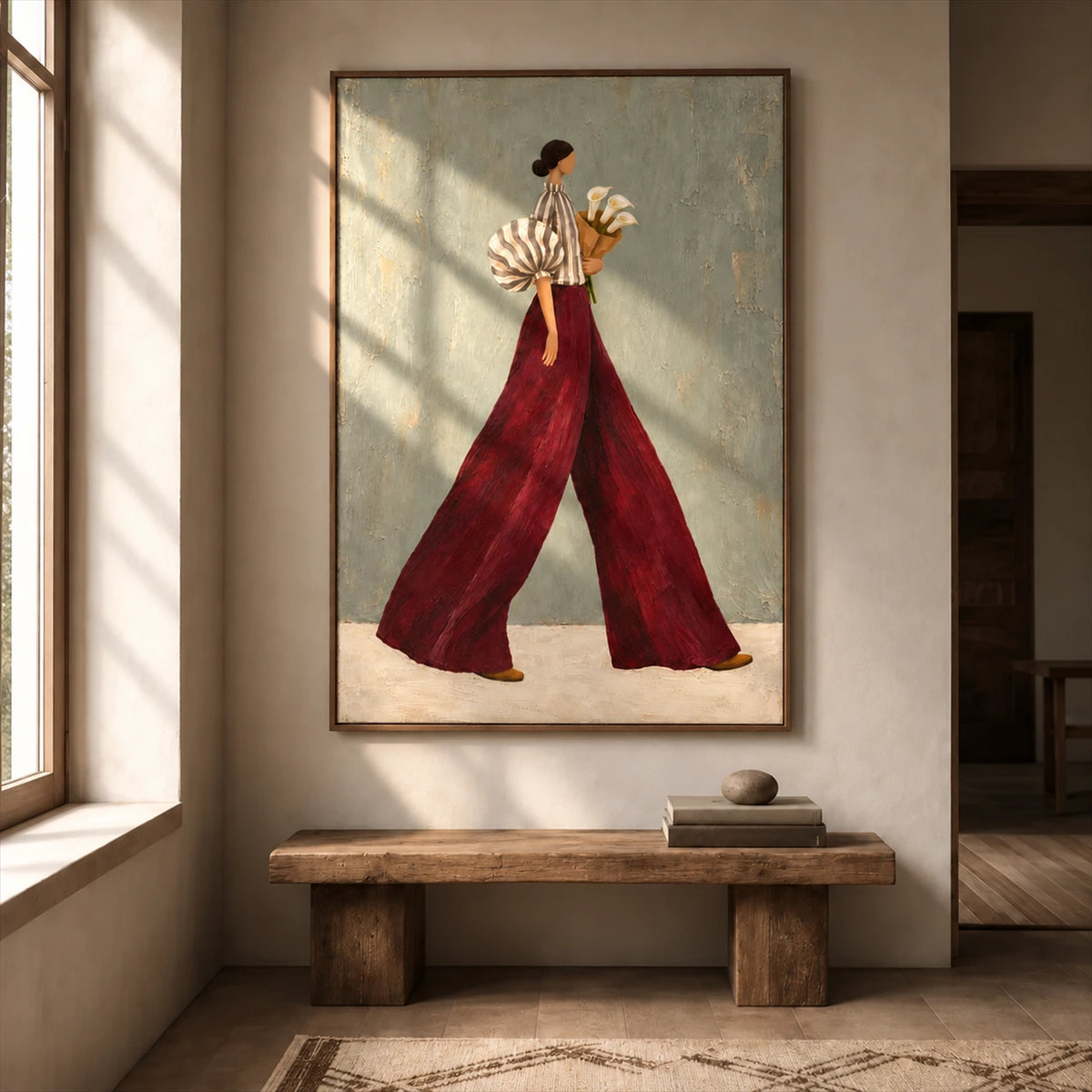 Garnet Stride artwork displayed above a rustic bench in an entryway.
