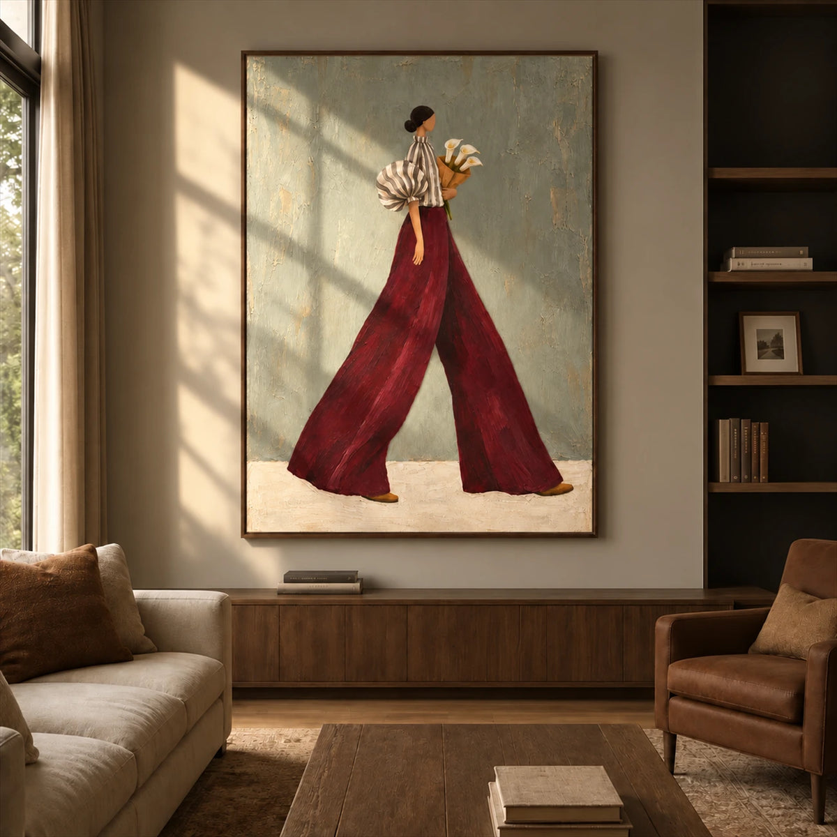 Garnet Stride artwork displayed above a low wooden cabinet in a living room.
