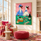 Duck Aperitif artwork displayed beside a cream armchair and red ottoman.