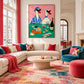 Duck Aperitif artwork displayed above a cream sectional sofa in a colorful living room.