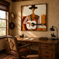 Mesa Ballad artwork displayed above a wooden desk in a rustic study.