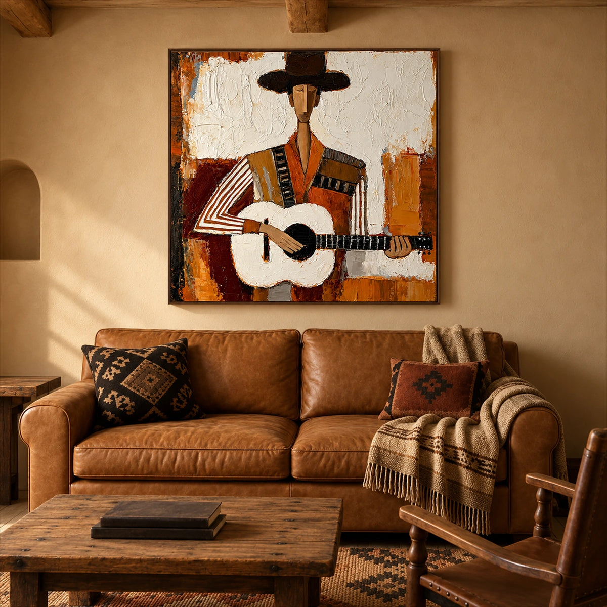 Mesa Ballad artwork displayed above a brown leather sofa.