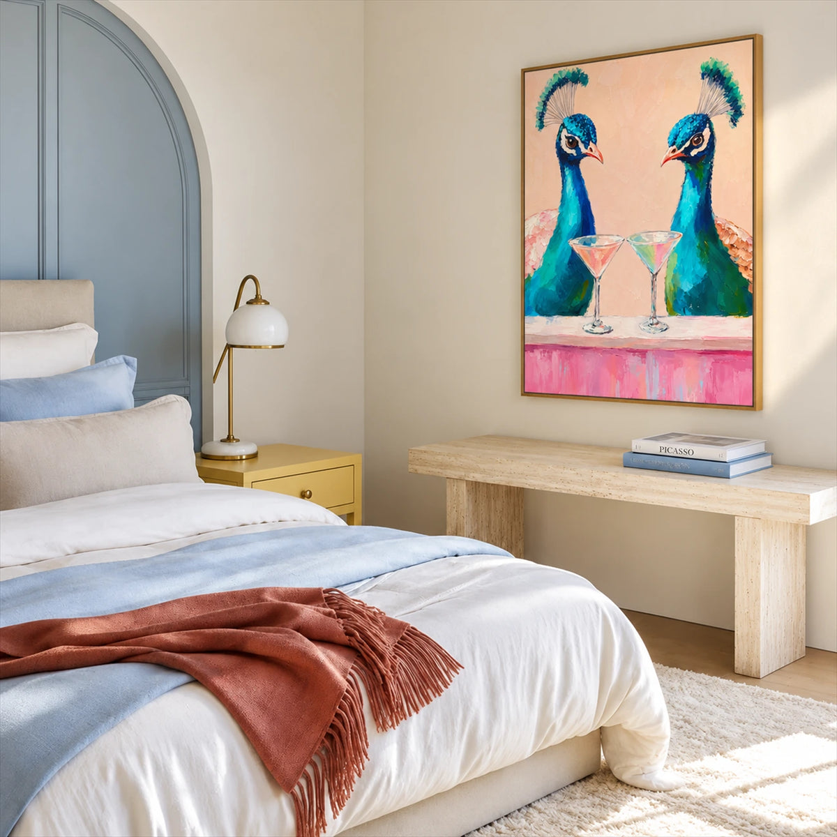 Peacock Aperitif artwork displayed beside a bed above a wooden console.