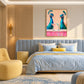 Peacock Aperitif artwork displayed above a blue upholstered bed.