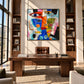Prism Chorus Wall Art displayed above a wooden desk between book-filled shelves.